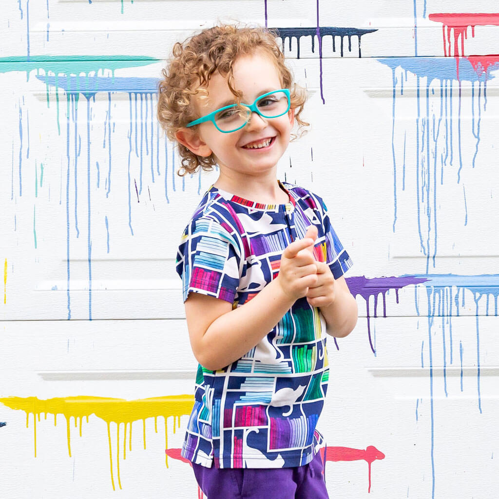 "Check Meowt" Rainbow Books & Cats Henley Short Sleeve Tee